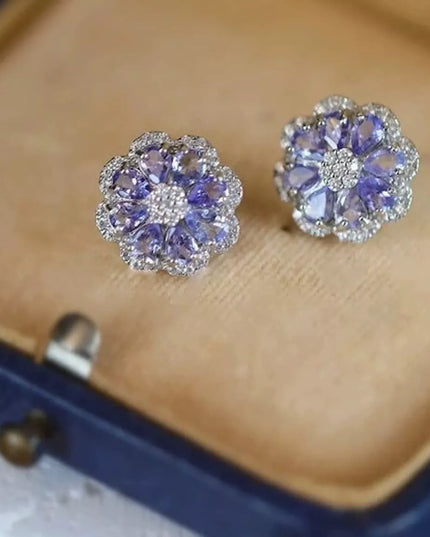 Clous d'oreilles en forme de fleur avec pierre de tanzanite